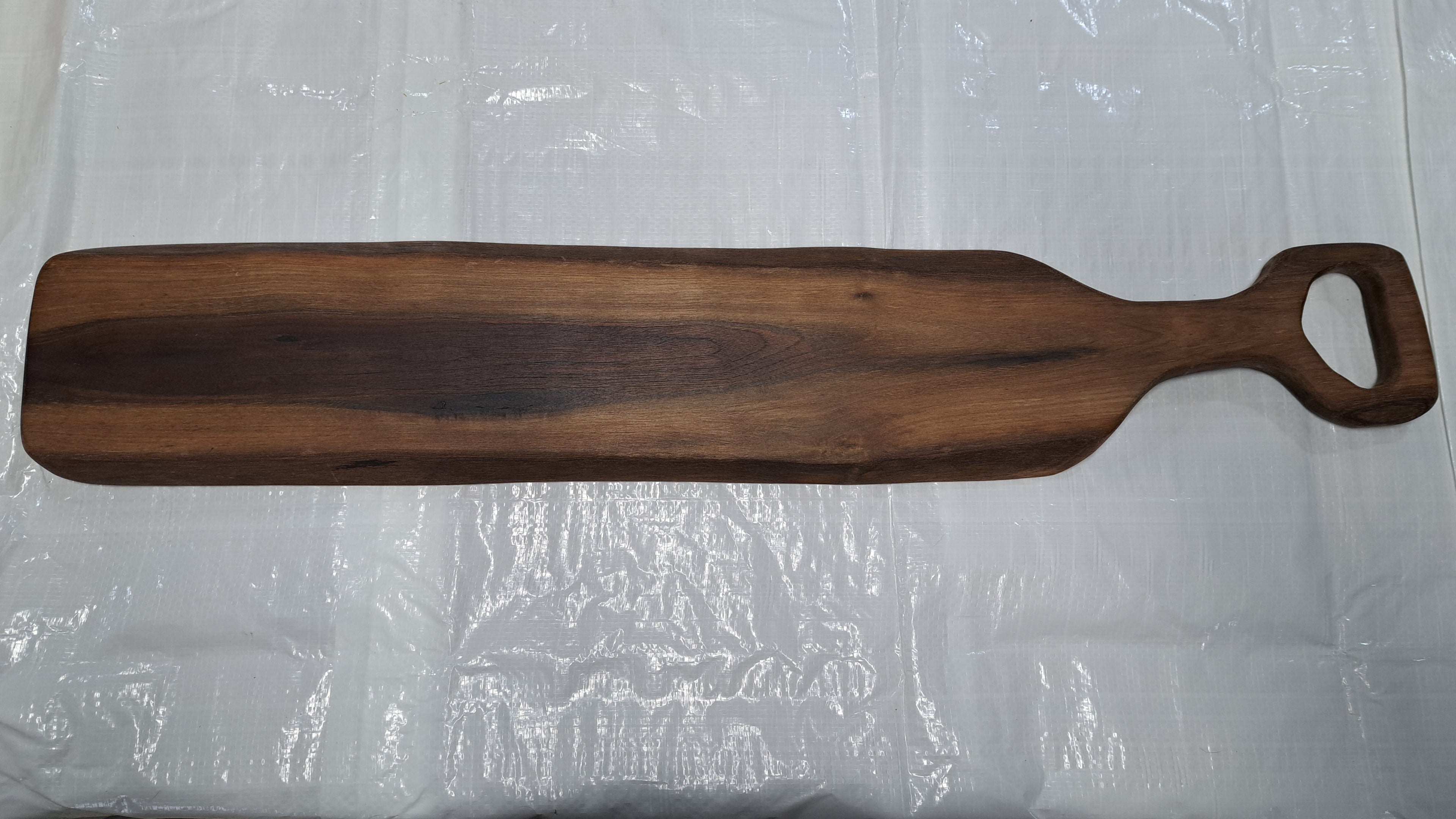 Finished board with handle